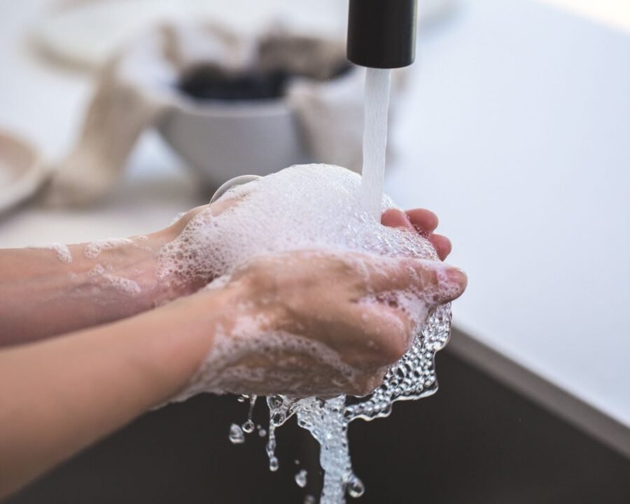 Unscented liquid soap and clean hands, the setup recommended for washing a new tattoo